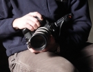 Michael Forster Rothbart ’94's hands and camera